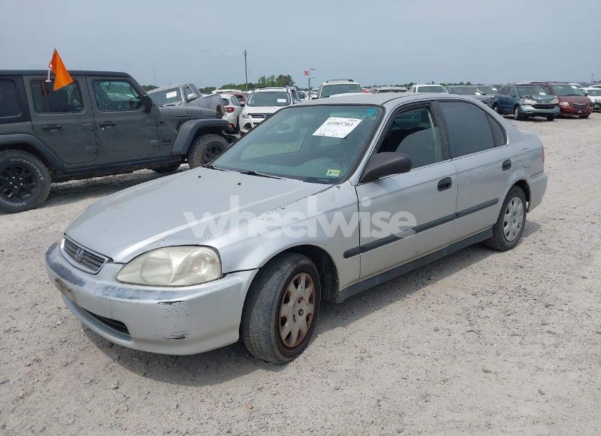 Photo 2 of 1999 Honda Civic LX (VIN 1HGEJ6677XL015230)