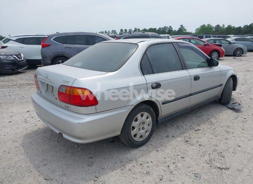 Photo 4 of 1999 Honda Civic LX (VIN 1HGEJ6677XL015230)