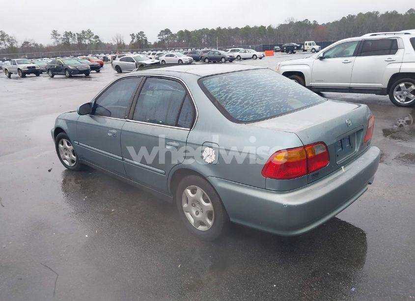 Photo 3 of 1999 Honda Civic EX (VIN 1HGEJ8643XL010821)