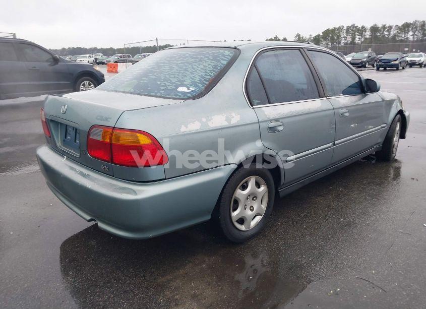 Photo 4 of 1999 Honda Civic EX (VIN 1HGEJ8643XL010821)