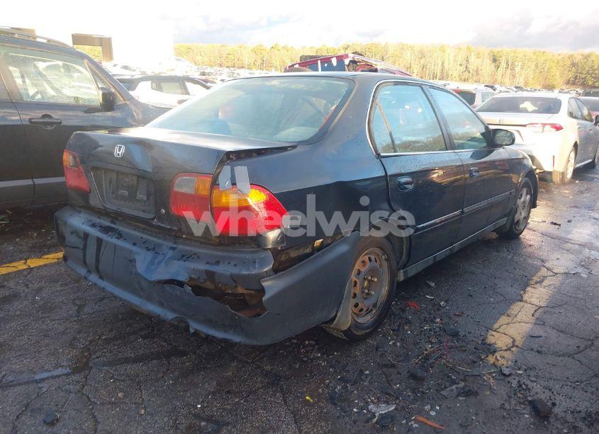 Photo 4 of 1999 Honda Civic EX (VIN 1HGEJ8644XL037266)