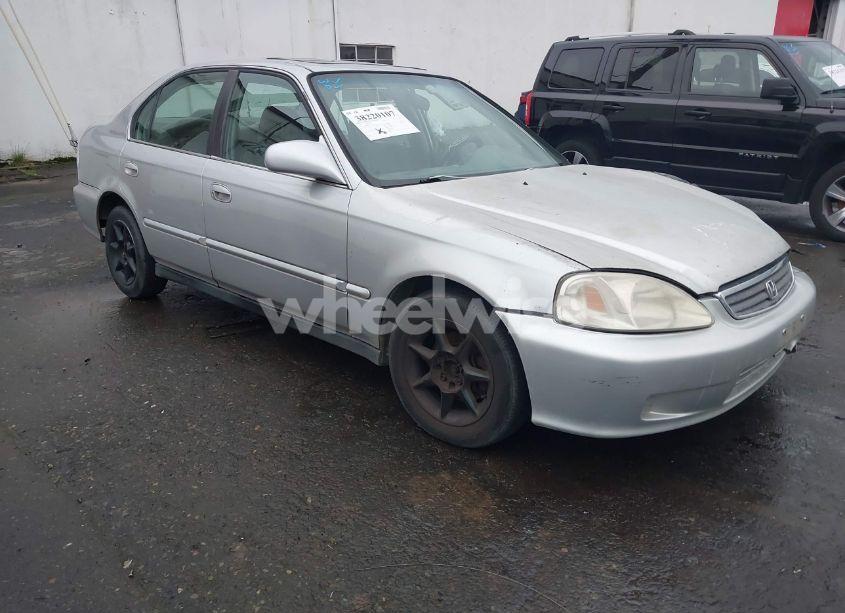 1999 Honda Civic EX (VIN 1HGEJ8649XL018096) main photo