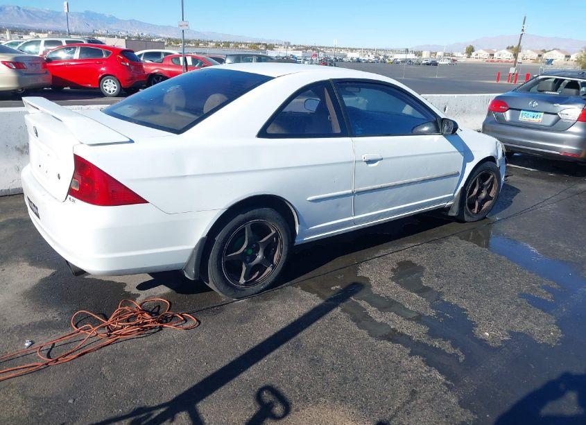 Photo 4 of 2003 Honda Civic LX (VIN 1HGEM22503L079012)