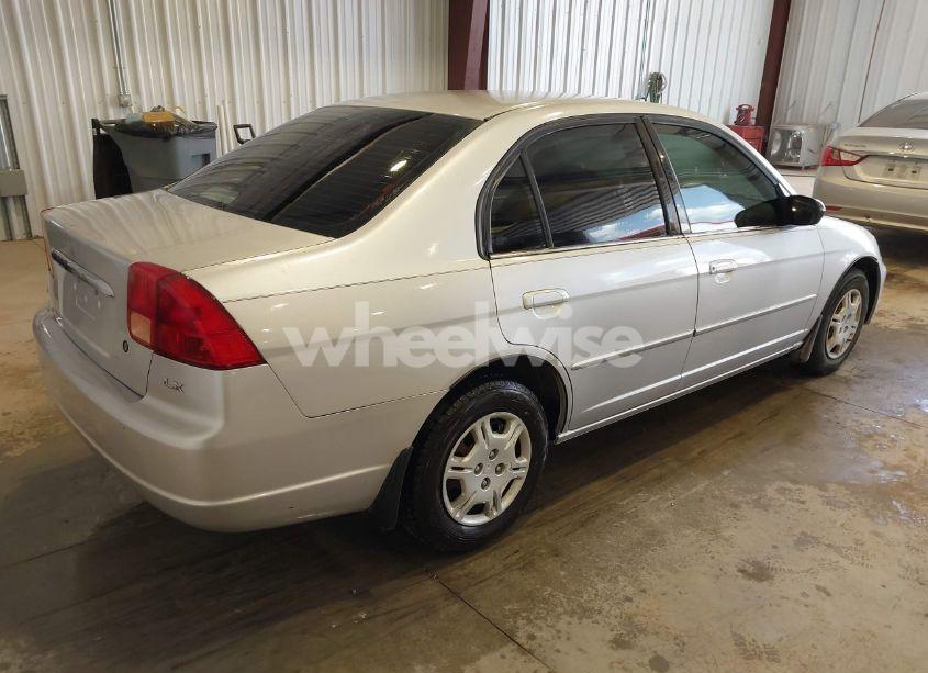 Photo 4 of 2002 Honda Civic LX (VIN 1HGES15532L060349)