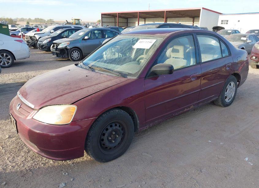 Photo 2 of 2002 Honda Civic LX (VIN 1HGES15622L038965)