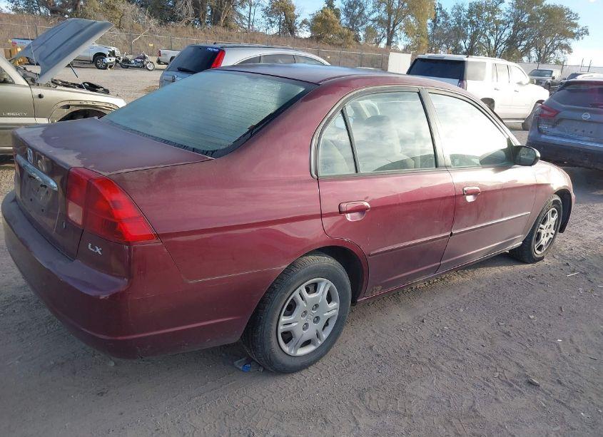 Photo 4 of 2002 Honda Civic LX (VIN 1HGES15622L038965)