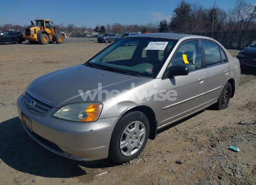 Photo 2 of 2002 Honda Civic LX (VIN 1HGES16502L018090)