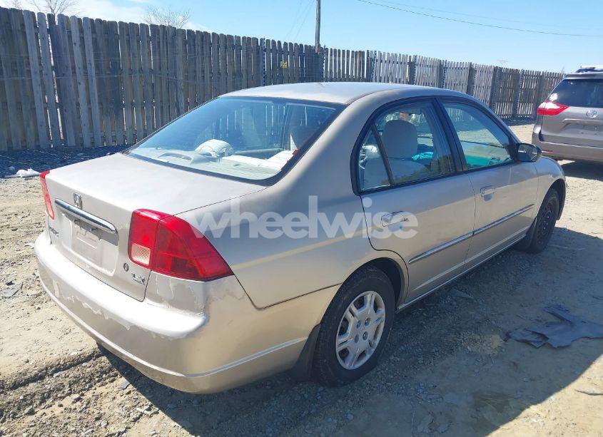 Photo 4 of 2002 Honda Civic LX (VIN 1HGES16502L018090)