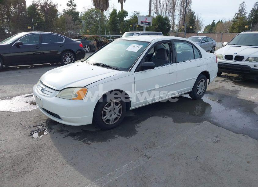 Photo 2 of 2002 Honda Civic LX (VIN 1HGES16502L040185)