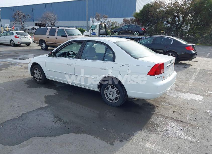 Photo 3 of 2002 Honda Civic LX (VIN 1HGES16502L040185)