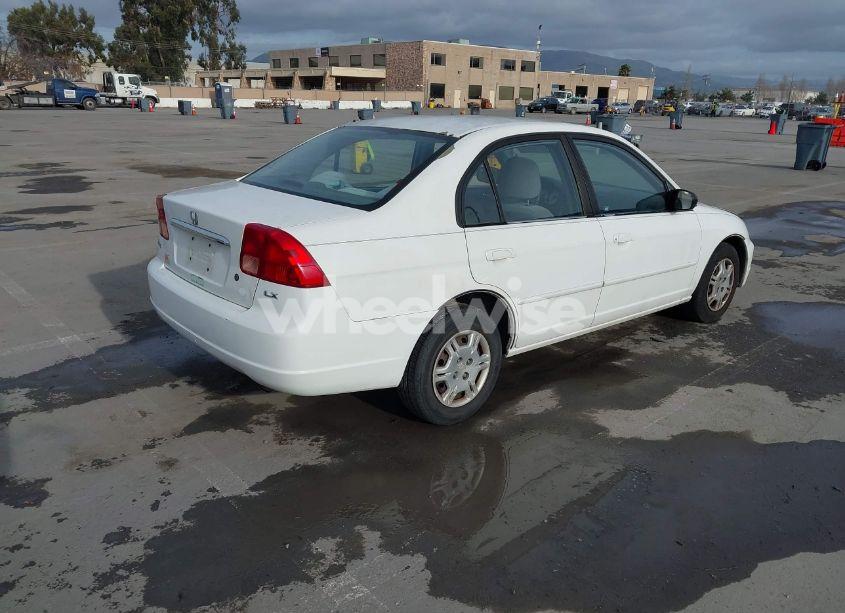 Photo 4 of 2002 Honda Civic LX (VIN 1HGES16502L040185)