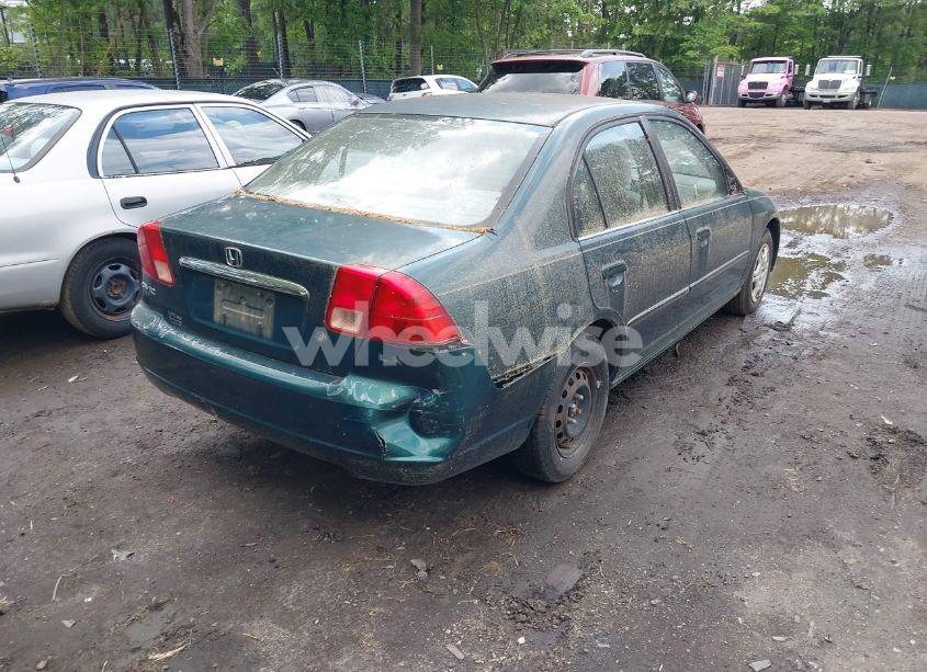 Photo 4 of 2002 Honda Civic LX (VIN 1HGES16502L049470)