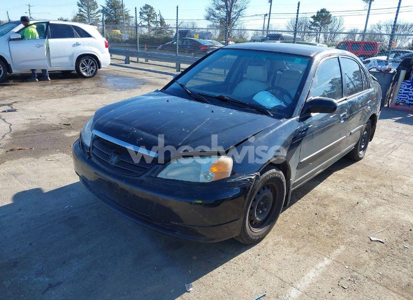 Photo 2 of 2002 Honda Civic LX (VIN 1HGES16502L050263)