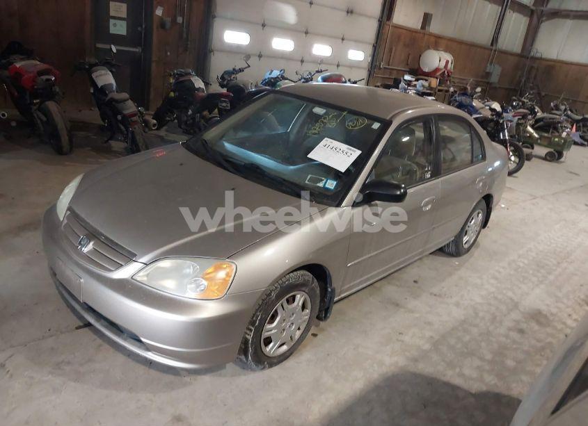 Photo 2 of 2002 Honda Civic LX (VIN 1HGES16512L025825)