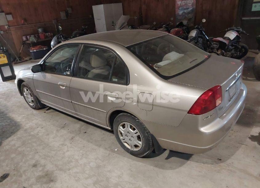 Photo 3 of 2002 Honda Civic LX (VIN 1HGES16512L025825)