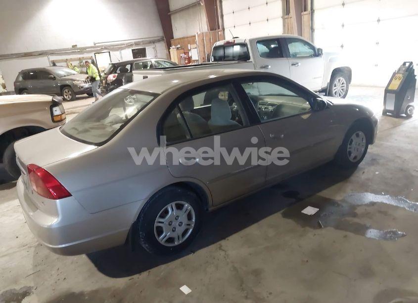 Photo 4 of 2002 Honda Civic LX (VIN 1HGES16512L025825)