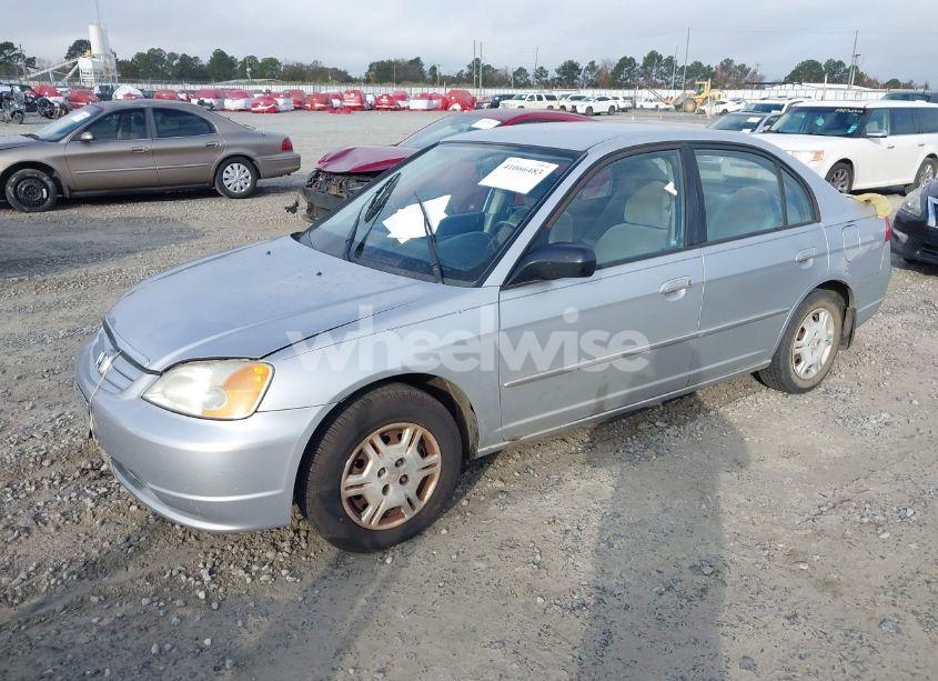 Photo 2 of 2002 Honda Civic LX (VIN 1HGES16512L051504)
