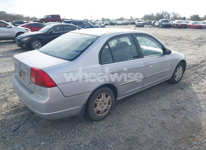 Photo 4 of 2002 Honda Civic LX (VIN 1HGES16512L051504)