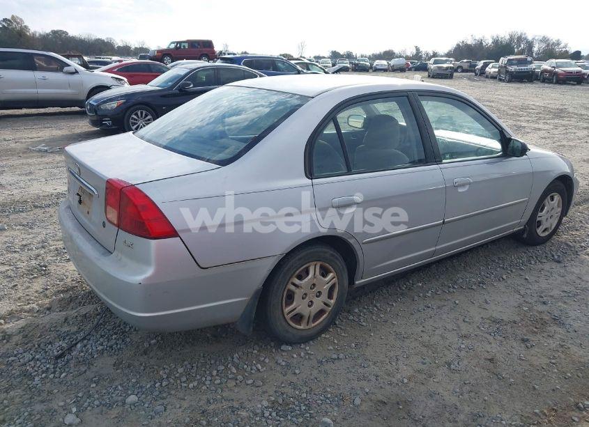Photo 6 of 2002 Honda Civic LX (VIN 1HGES16512L051504)