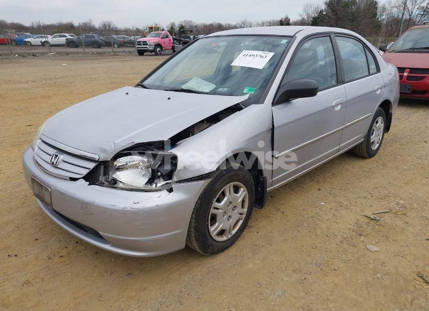 Photo 2 of 2002 Honda Civic LX (VIN 1HGES16512L056573)