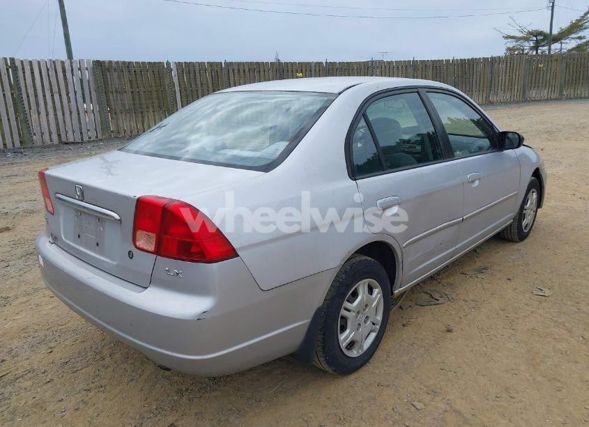 Photo 4 of 2002 Honda Civic LX (VIN 1HGES16512L056573)