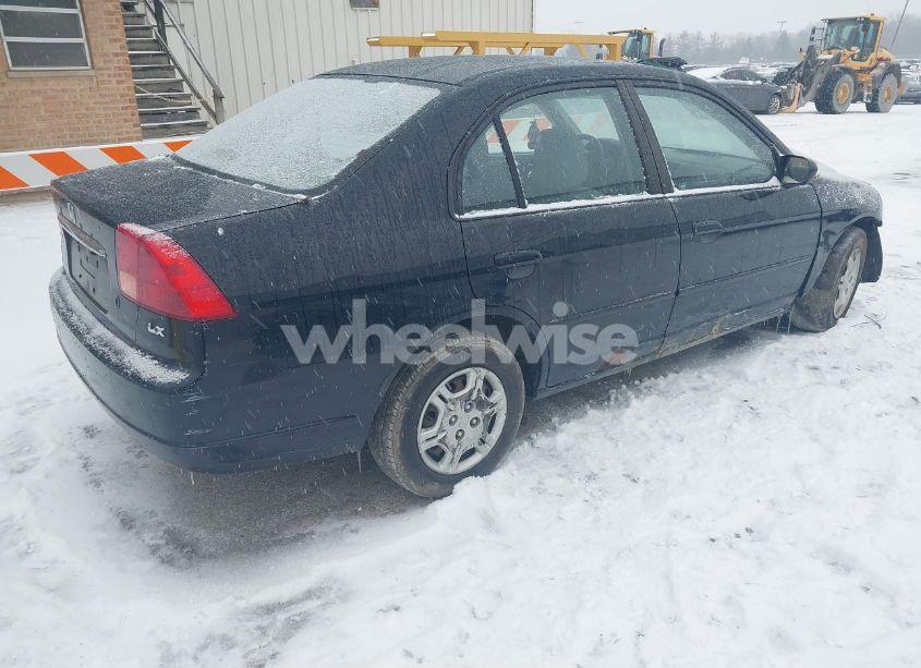 Photo 4 of 2002 Honda Civic LX (VIN 1HGES16512L081988)