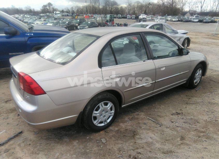 Photo 4 of 2002 Honda Civic LX (VIN 1HGES16522L036946)