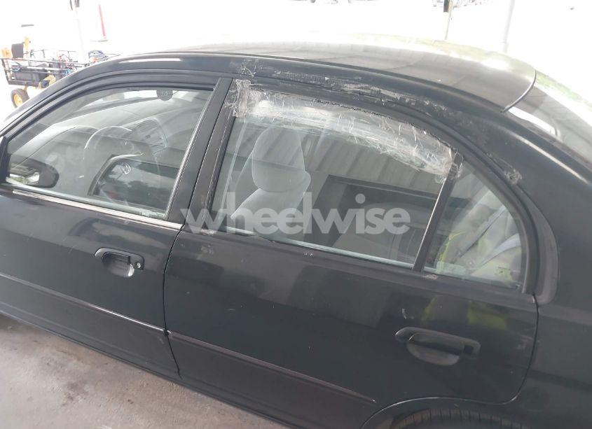 Photo 6 of 2002 Honda Civic LX (VIN 1HGES16532L001638)