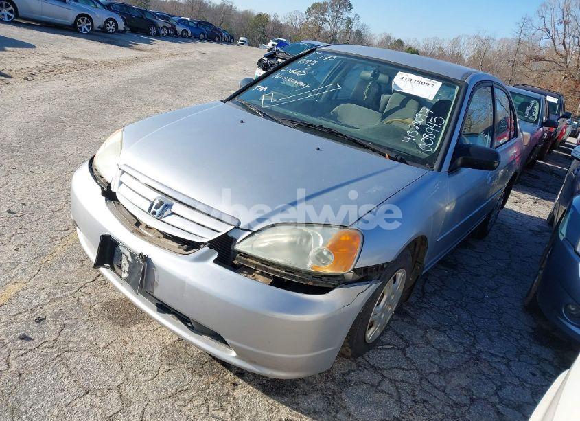 Photo 2 of 2002 Honda Civic LX (VIN 1HGES16532L008945)