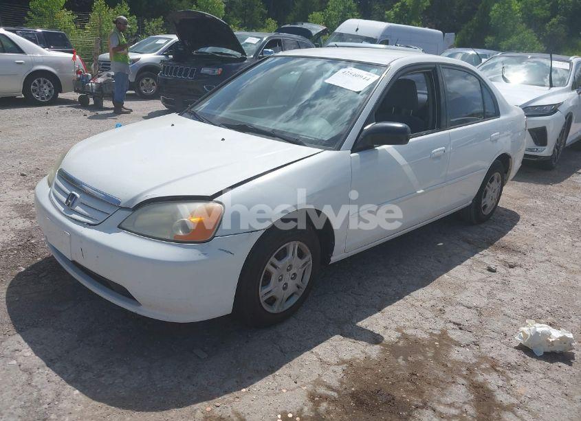 Photo 2 of 2002 Honda Civic LX (VIN 1HGES16532L027057)