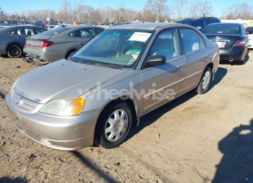 Photo 2 of 2002 Honda Civic LX (VIN 1HGES16542L034986)