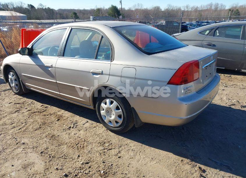 Photo 3 of 2002 Honda Civic LX (VIN 1HGES16542L034986)