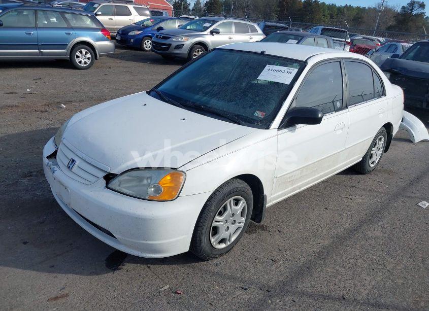 Photo 2 of 2002 Honda Civic LX (VIN 1HGES16542L035054)