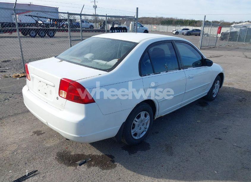 Photo 4 of 2002 Honda Civic LX (VIN 1HGES16542L035054)