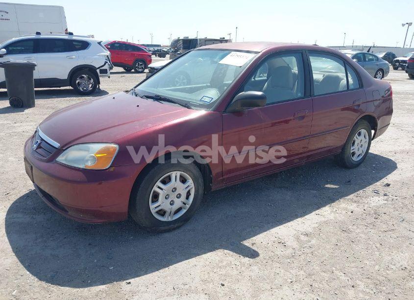 Photo 2 of 2002 Honda Civic LX (VIN 1HGES16542L057636)