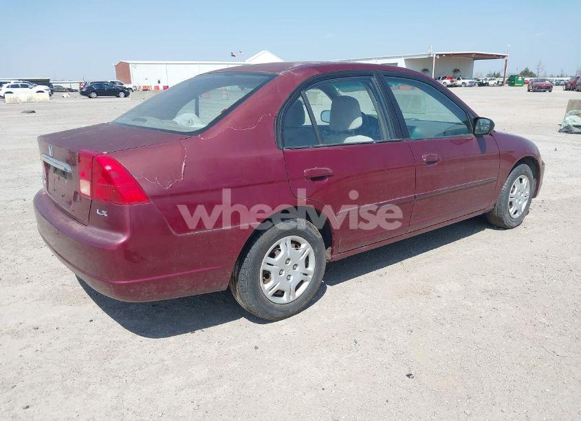 Photo 4 of 2002 Honda Civic LX (VIN 1HGES16542L057636)