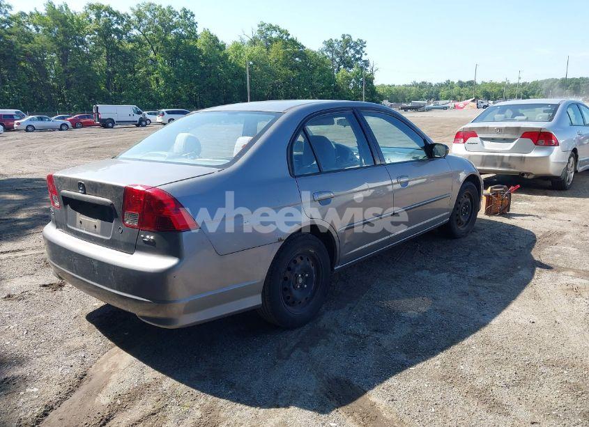 Photo 4 of 2004 Honda Civic LX (VIN 1HGES16544L016152)