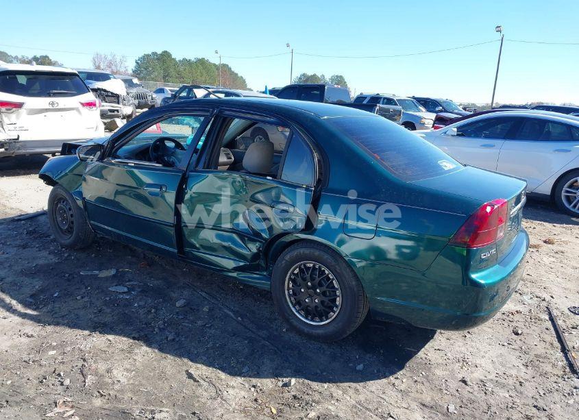 Photo 3 of 2002 Honda Civic LX (VIN 1HGES16562L054995)