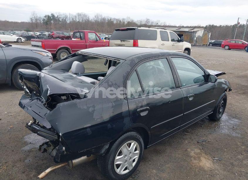 Photo 4 of 2003 Honda Civic LX (VIN 1HGES16573L038242)