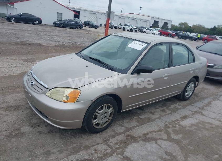 Photo 2 of 2002 Honda Civic LX (VIN 1HGES16582L003451)