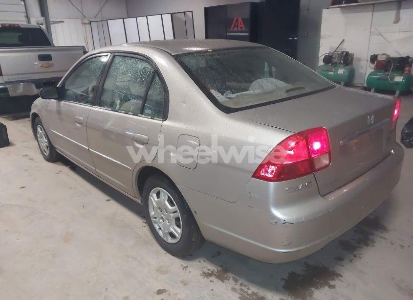 Photo 3 of 2002 Honda Civic LX (VIN 1HGES16592L058765)