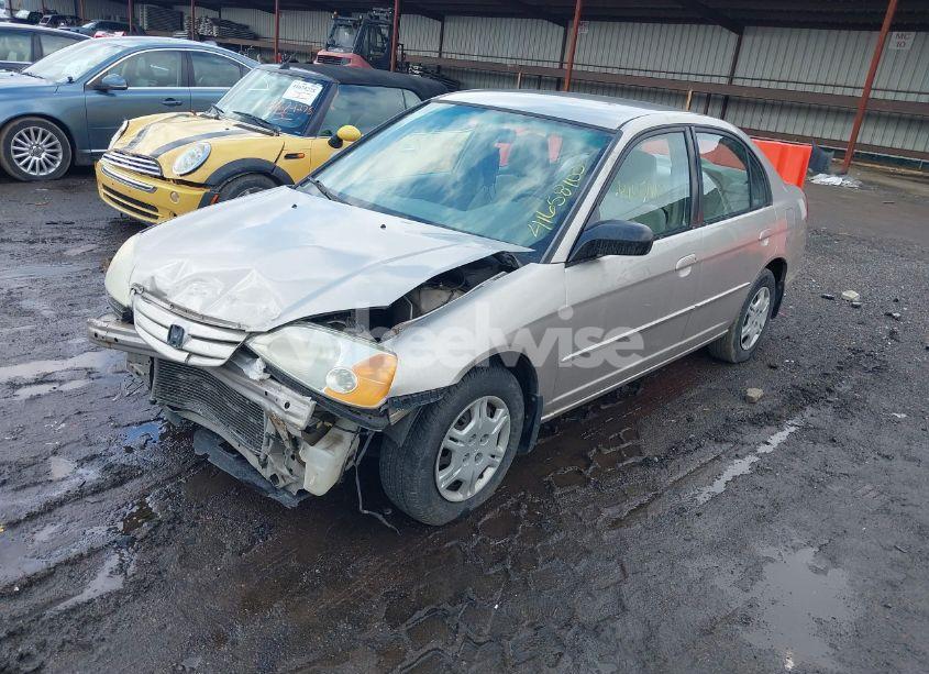 Photo 2 of 2002 Honda Civic LX (VIN 1HGES165X2L067538)