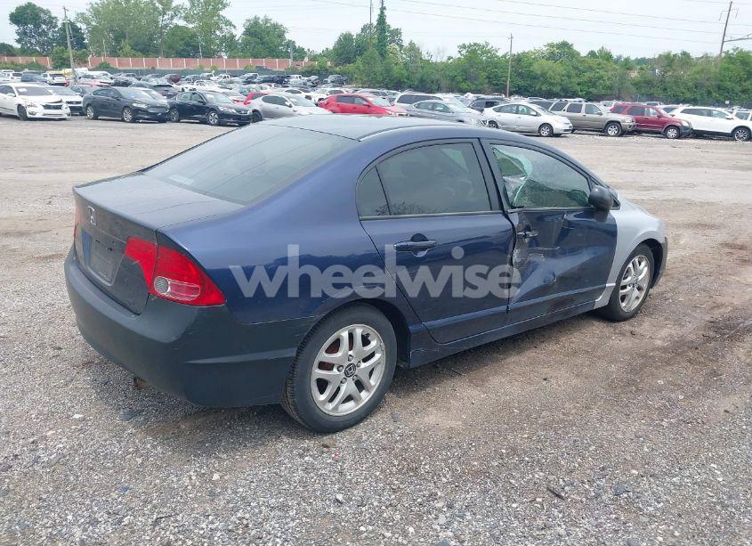 Photo 4 of 2006 Honda Civic LX (VIN 1HGFA16516L106501)