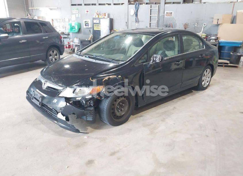 Photo 2 of 2006 Honda Civic LX (VIN 1HGFA165X6L103659)