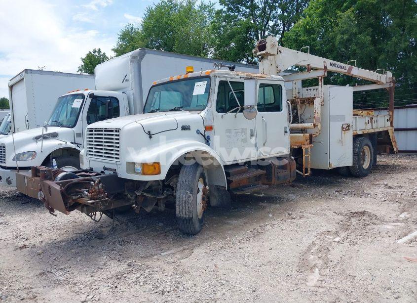 Photo 2 of 1999 International 4000 4900 (VIN 1HTSDAAN0XH610573)