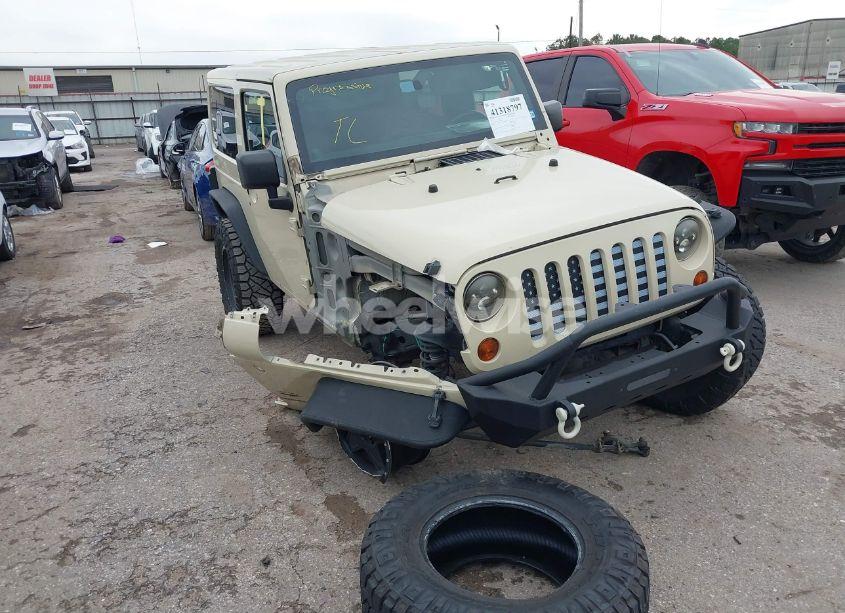 2011 Jeep Wrangler SAHARA (VIN 1J4AA5D1XBL634042) main photo