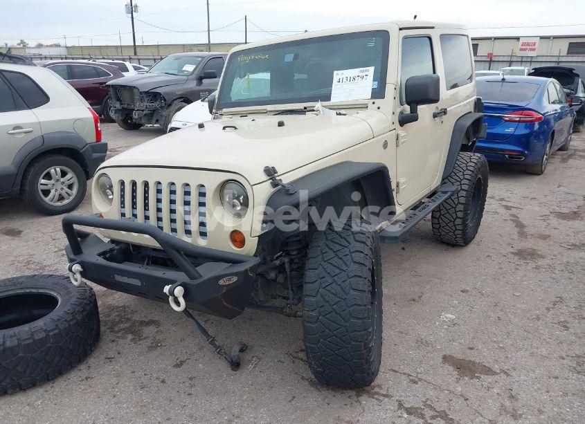 Photo 2 of 2011 Jeep Wrangler SAHARA (VIN 1J4AA5D1XBL634042)