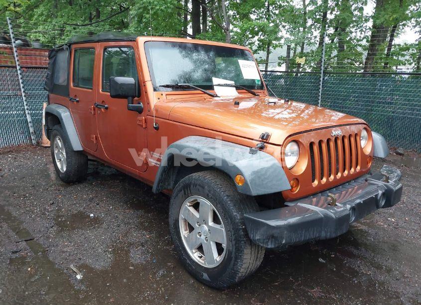 2011 Jeep Wrangler UNLIMITED SPORT (VIN 1J4BA3H12BL524010) main photo
