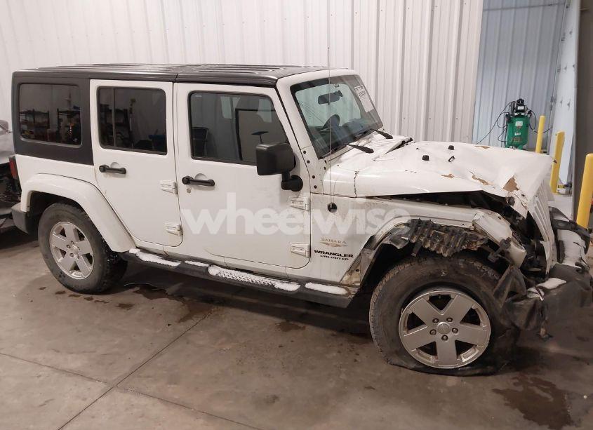 2011 Jeep Wrangler UNLIMITED SAHARA (VIN 1J4BA5H10BL634615) main photo