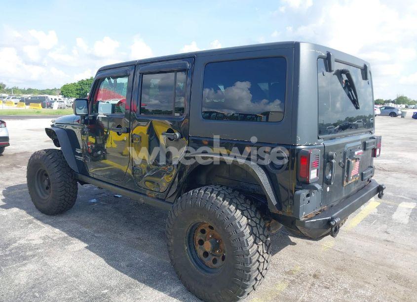 Photo 3 of 2011 Jeep Wrangler UNLIMITED SAHARA (VIN 1J4BA5H11BL520669)